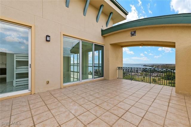 view of patio / terrace featuring a water view