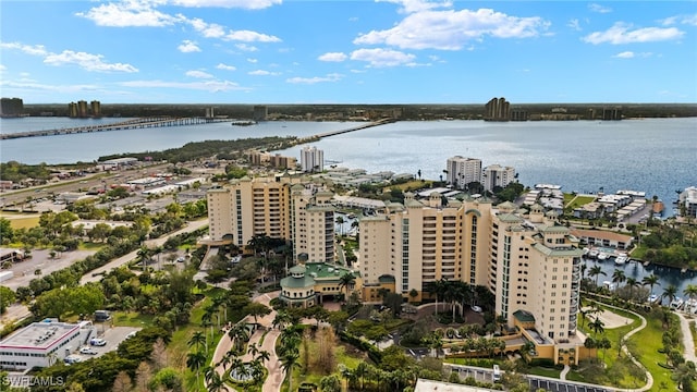 bird's eye view featuring a water view and a view of city