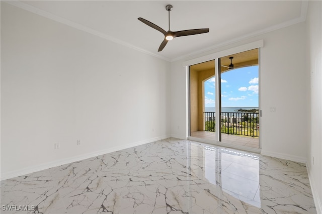 unfurnished room with a water view, marble finish floor, baseboards, and crown molding