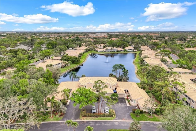 aerial view featuring a water view and a residential view