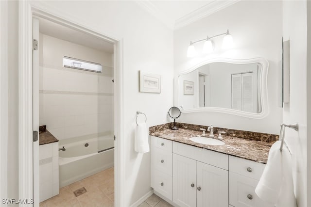 bathroom featuring crown molding, a closet, tub / shower combination, vanity, and tile patterned floors