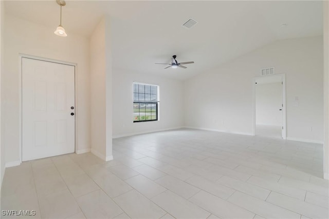 entrance foyer featuring ceiling fan, visible vents, baseboards, and vaulted ceiling