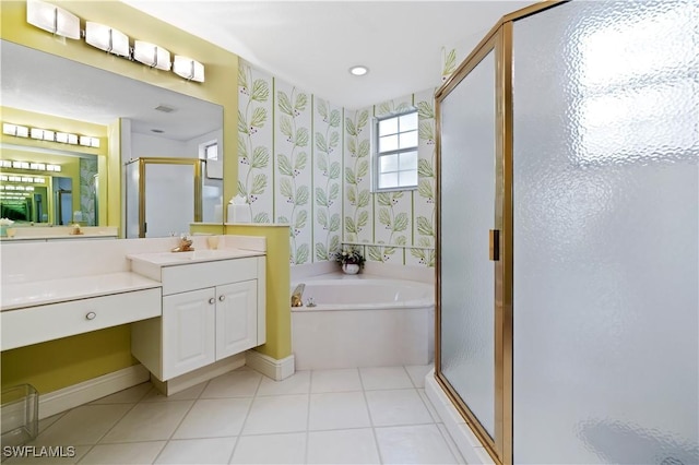 bathroom featuring tile patterned flooring, recessed lighting, a stall shower, a bath, and vanity