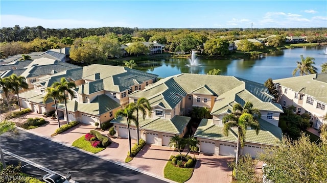 aerial view with a residential view and a water view