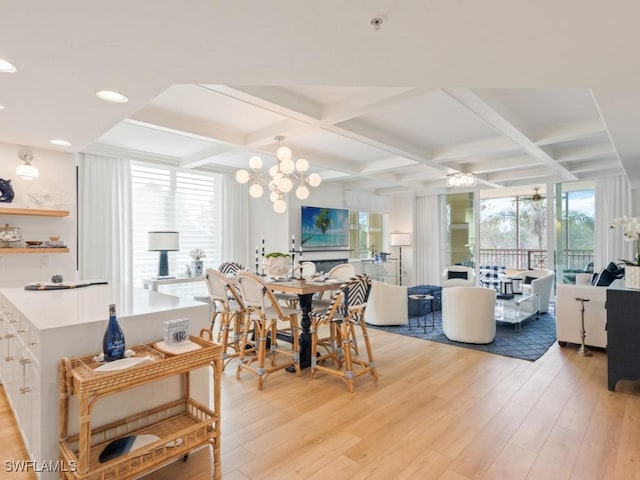 dining space featuring recessed lighting, light wood-style flooring, an inviting chandelier, coffered ceiling, and beamed ceiling