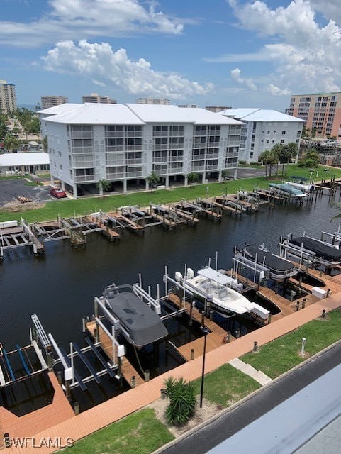 view of dock featuring a water view and boat lift