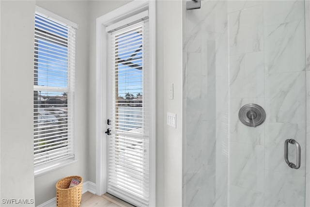 entryway featuring baseboards