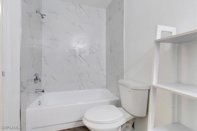 full bathroom featuring bathing tub / shower combination and toilet