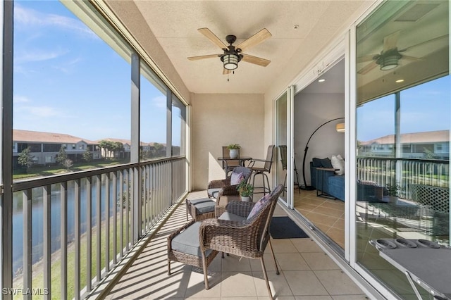 sunroom / solarium with ceiling fan