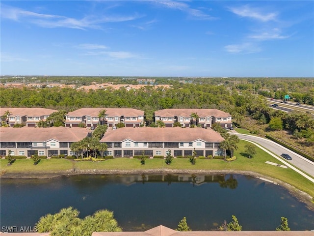 aerial view featuring a water view and a residential view