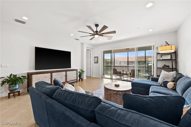 living room with light tile patterned floors, baseboards, visible vents, and recessed lighting