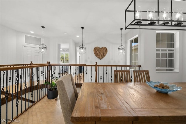 dining space with an inviting chandelier, light tile patterned floors, visible vents, and recessed lighting