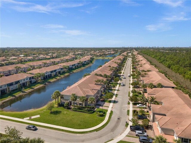 bird's eye view with a water view and a residential view