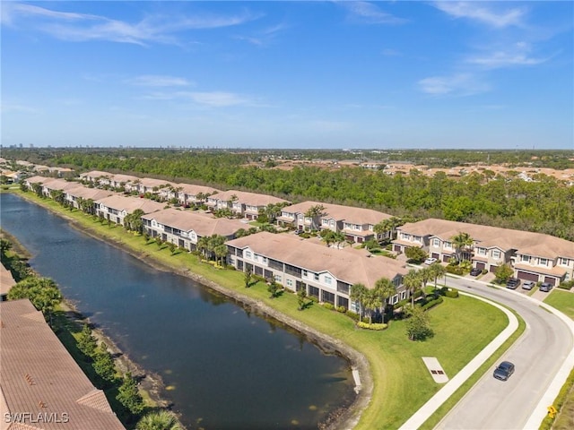 bird's eye view with a residential view and a water view