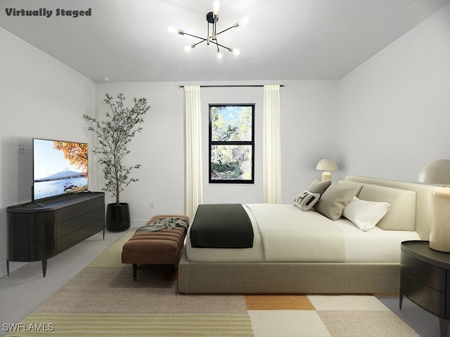 bedroom featuring an inviting chandelier