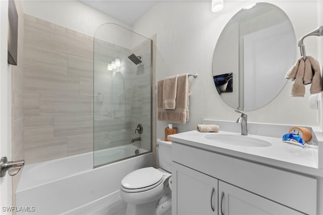 full bath featuring  shower combination, vanity, and toilet