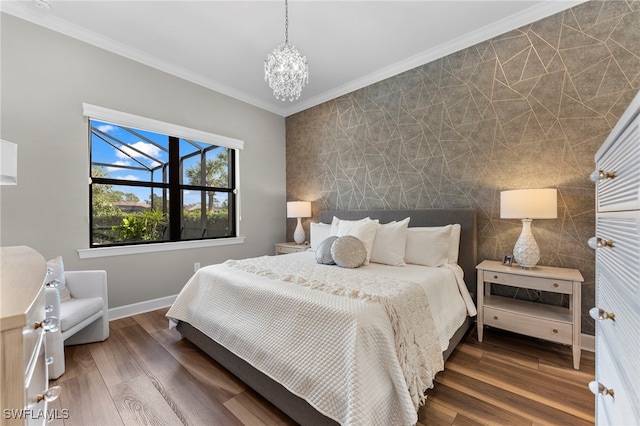 bedroom with baseboards, a chandelier, crown molding, and wood finished floors