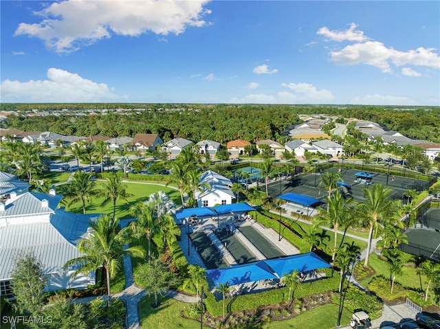 birds eye view of property with a residential view