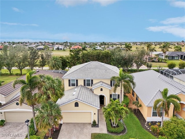 birds eye view of property with a residential view