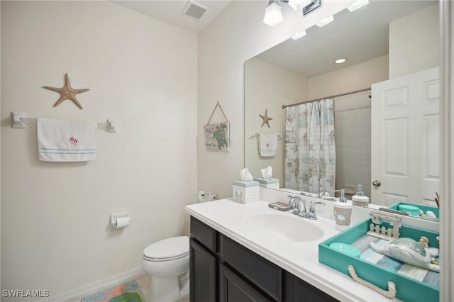 bathroom featuring baseboards, visible vents, a shower with shower curtain, toilet, and vanity