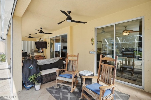 view of patio / terrace with outdoor lounge area and a ceiling fan