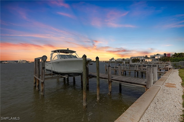 view of dock with a water view and boat lift