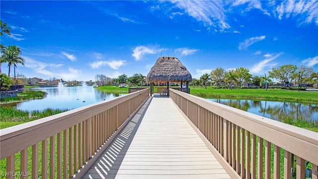 view of community featuring a gazebo and a water view