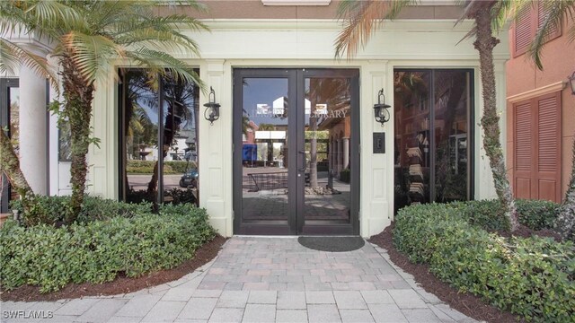 property entrance featuring french doors