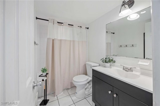 full bath featuring toilet, curtained shower, vanity, and tile patterned floors