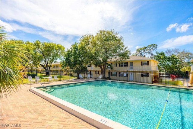 community pool with fence