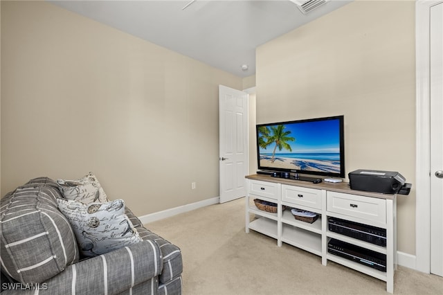 living room with light colored carpet, visible vents, and baseboards