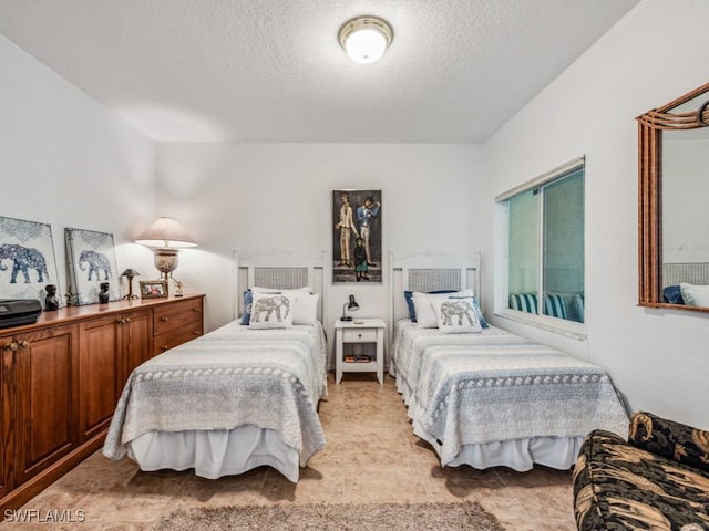 bedroom with a textured ceiling