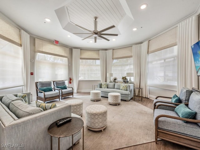 living area with ceiling fan, wood finished floors, and recessed lighting