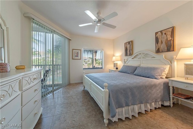 bedroom featuring access to exterior, tile patterned floors, and a ceiling fan