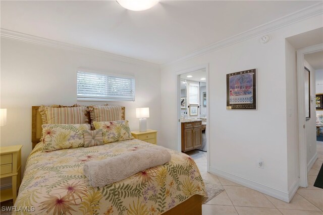 445 3rd Ave S Unit 102, Naples, FL 34102 - bedroom featuring ornamental molding, light tile patterned flooring, and ensuite bath