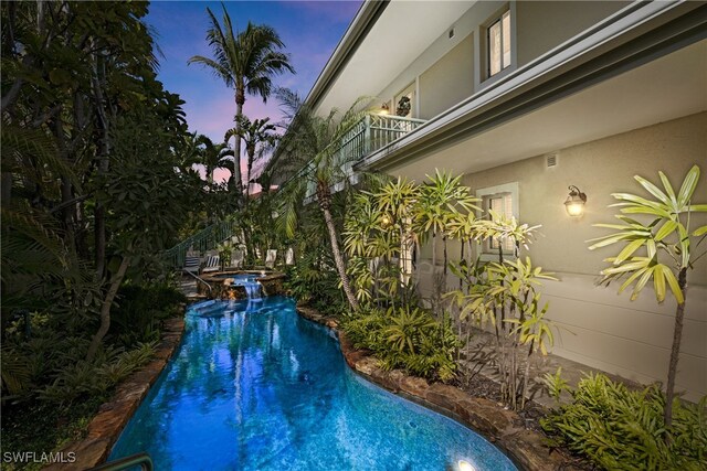 445 3rd Ave S Unit 102, Naples, FL 34102 - view of swimming pool with a pool with connected hot tub