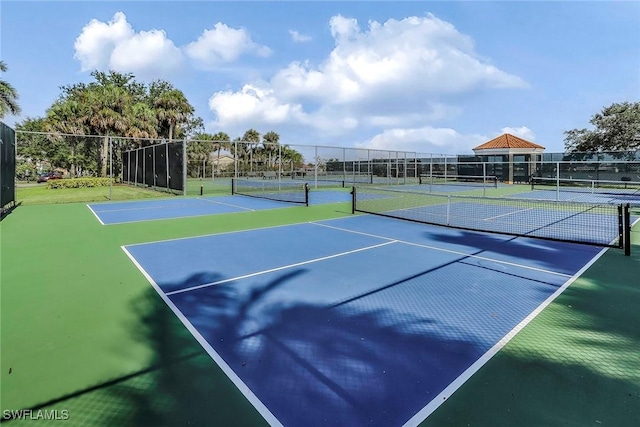 view of sport court with community basketball court and fence