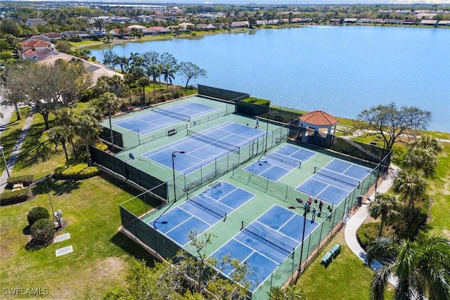 bird's eye view with a water view