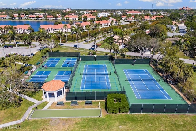 aerial view with a residential view and a water view