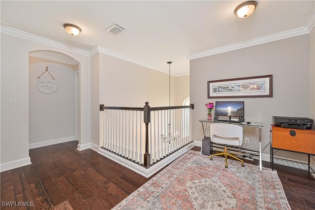 office with dark wood-type flooring, visible vents, ornamental molding, and baseboards