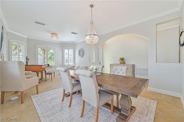 dining area featuring light tile patterned floors, visible vents, and baseboards
