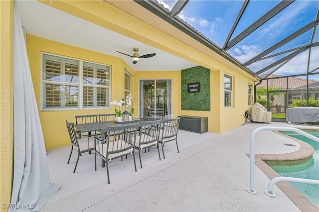 exterior space with ceiling fan