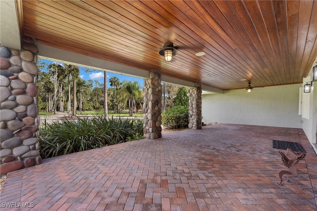 view of patio featuring ceiling fan