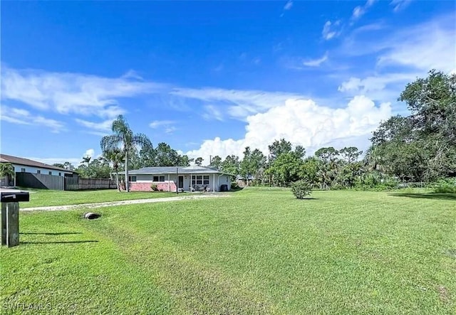 view of yard with fence