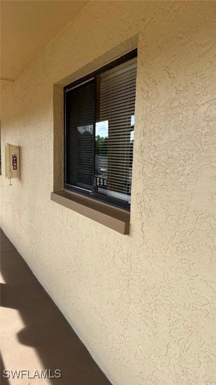 details featuring stucco siding