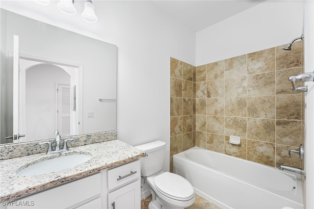 full bathroom featuring shower / bathtub combination, toilet, and vanity