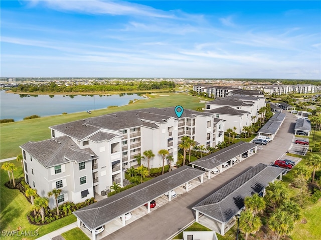 bird's eye view with a water view