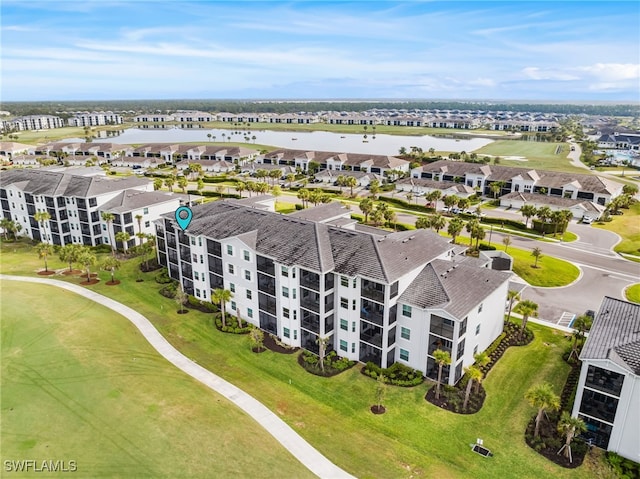 birds eye view of property featuring a residential view, golf course view, and a water view