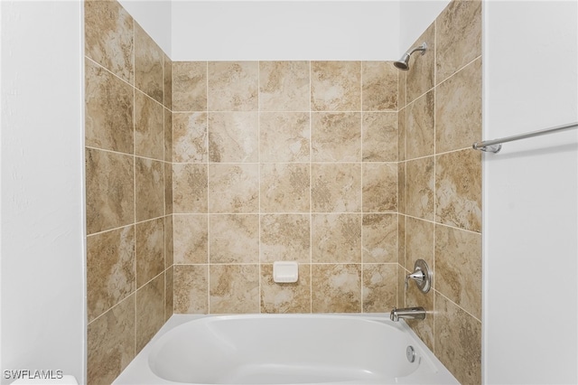 full bath featuring shower / washtub combination