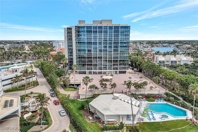 birds eye view of property with a water view